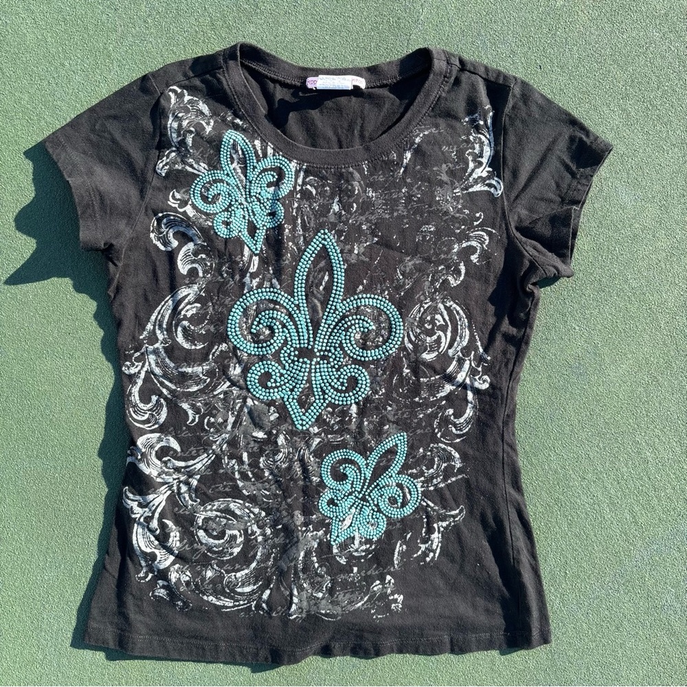 Black Short Sleeve Tee with Teal Fleur-de-Lis Embellishment